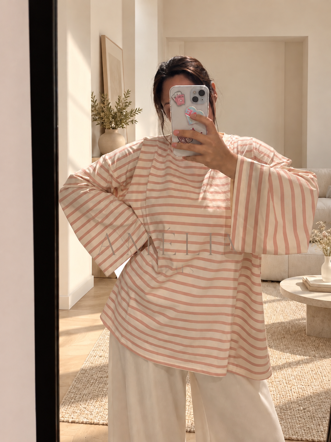 Pull oversize a rayures rose